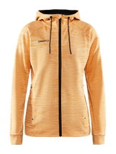 Craft Kapuzenjacke ADV Unify (funktionelles Recyclingpolyester) orange Damen