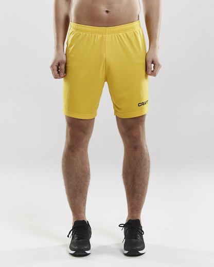 Craft Spodenki sportowe (krótkie) Squad Solid - bez wewnętrznych spodenek, elastyczny materiał - żółty męski