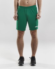 Craft Sporthose (Short) Squad Solid - ohne Innenshort, elastisches Material - grün Herren