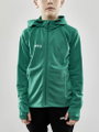 Craft Trainingsjacke Evolve Hood - strapazierfähige Mid-Layer-Kapuzenjacke aus Stretchmaterial - grün Kinder