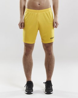 Craft Sporthose (Short) Squad Solid - ohne Innenshort, elastisches Material - gelb Herren